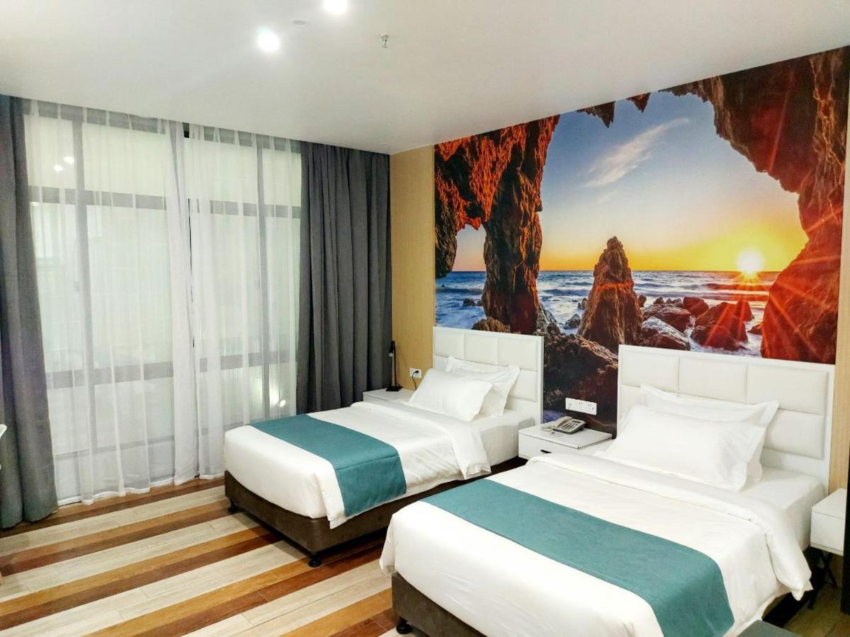 Fan'S Hotel Baybay Bagian luar foto